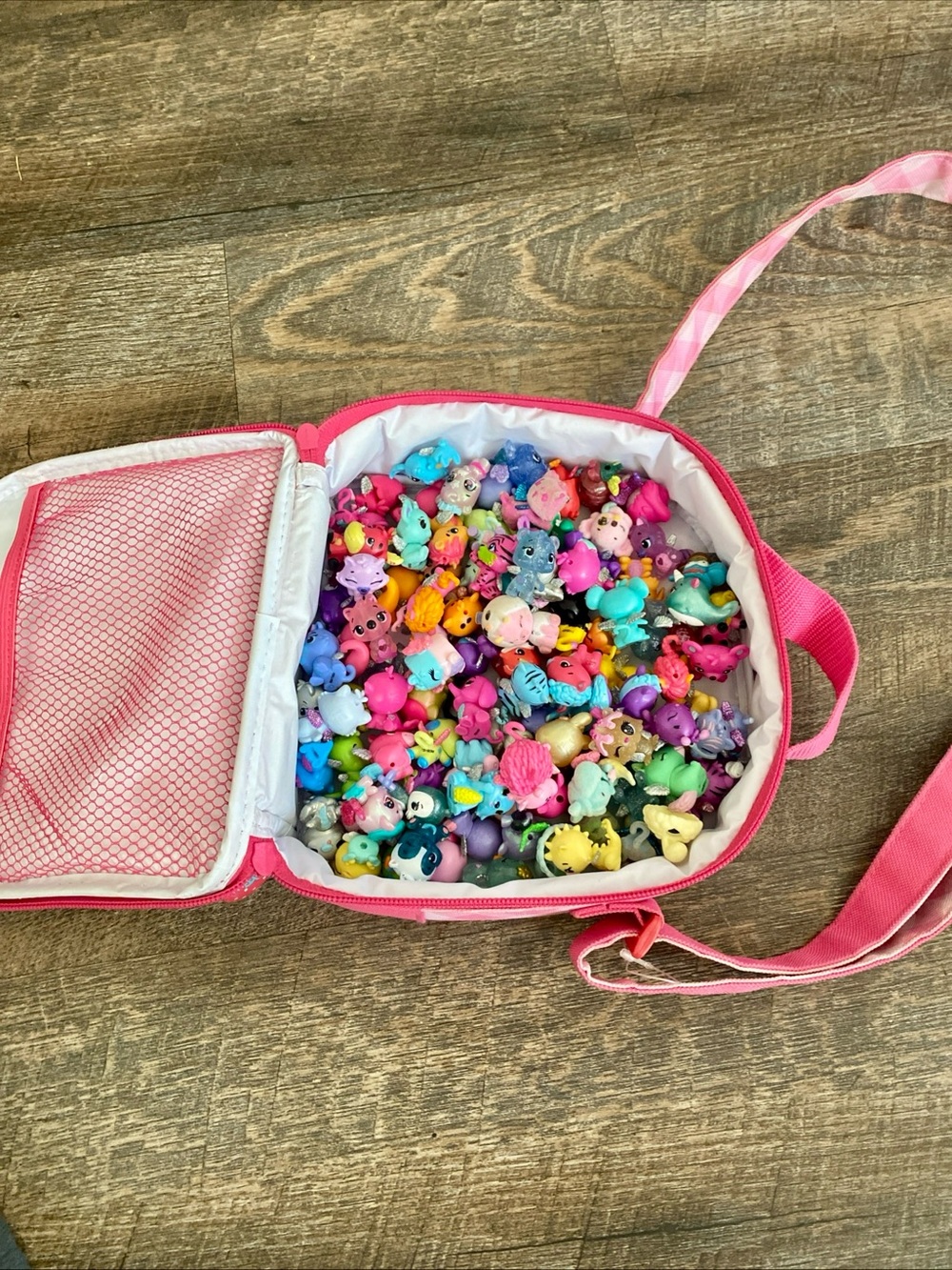 Large Lot Of 104 Hatchimals Mini Figures Comes With Hello Kitty Lunch Bag.